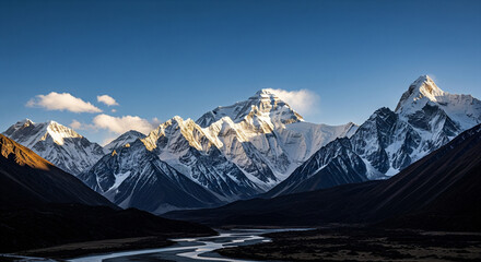 Majestic Mountain Range with River at Golden Hour Sunset
A breathtaking panoramic landscape of a massive snow-capped mountain range, illuminated by the warm, golden light of a setting sun
