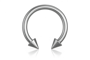 Isolated silver horseshoe body piercing with spiked ends on transparent