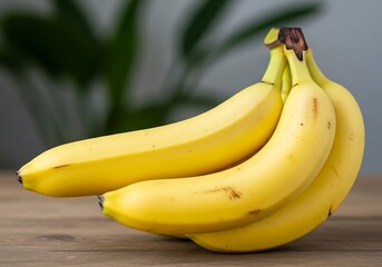 Bunch of Ripe Bananas on Wooden Table.