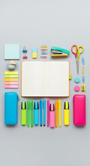 Overhead shot of organized stationery on a gray surface, featuring a notebook, highlighters, colored pencils, scissors, paper clips, washi tape, sticky notes, pencil case, and pen, creating a neat and