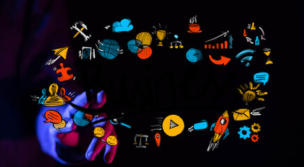 Hand holding colorful business icons.  Growth, strategy, planning, success.