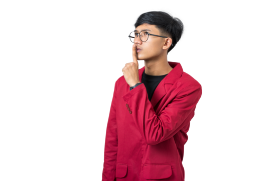 Young college student shushing gesture with finger on lips isolated on white background