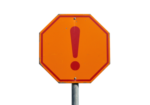 Isolated orange octagonal road sign showing exclamation point symbol on silver pole outdoors