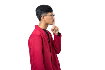 Young college student shushing gesture with finger on lips isolated on white background