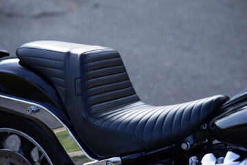 Motorcycle leather seat close-up.