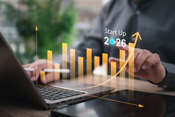 Business Start Up 2026 Concept,Businessman Presenting Growth Graph, Startup Planning,Future Goals,Corporate Development, Financial Strategy,Market Forecast,Entrepreneurship,Innovation, Business Growth