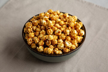 Homemade Caramel Pop Corn in a Bowl, low angle view.