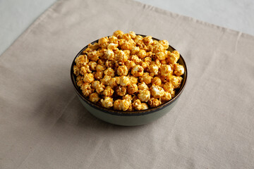 Homemade Caramel Pop Corn in a Bowl, low angle view.