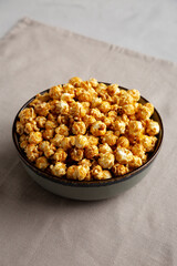 Homemade Caramel Pop Corn in a Bowl, low angle view.