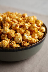 Homemade Caramel Pop Corn in a Bowl, low angle view. Close-up.