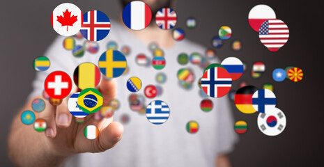 A person reaching out with flags of countries. Illustrating international cooperation, global...