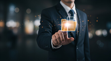 Businessman touching virtual document folder icon demonstrating data management