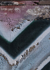 cracked and peeling paint on a wall surface. The weathered texture shows layers of faded blue and white paint flaking off, revealing an aged and distressed background. Perfect as a grunge overlay.