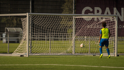 Football player youth scoring