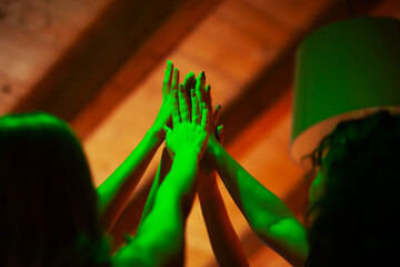 Group of people with hands together in symbolic unity and harmony
