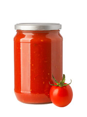 Glass jar of tomato sauce with raw tomato