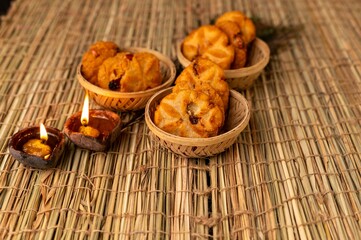 Thekua is a traditional Bihari sweet made from wheat flour, jaggery, and ghee. Deeply connected with Chhath Puja, it’s offered as prasad and loved for its crispy texture and rich homemade flavor.