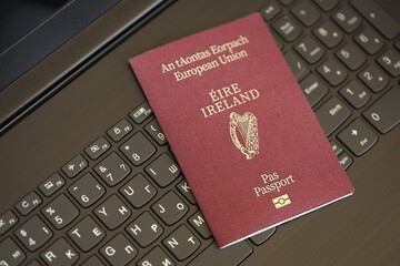 Ireland Passport Lies Black Laptop
