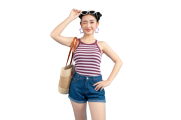 Portrait of a stylish woman with sunglasses on her head, winking. She's holding a shoulder bag. PNG