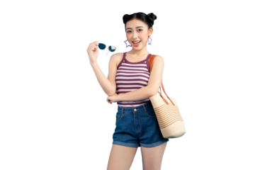 Portrait young Asian woman holding sunglasses and a beach bag. Her look indicates the arrival of summer on PNG