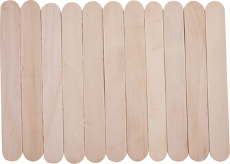 A close-up photo of a group of wooden popsicle sticks arranged vertically, looking simple, isolated on a transparent background