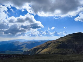 Majestic Cloudscape Over Rolling Bucegi Mountain Peak