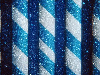 Abstract close-up showing alternating blue & white vertical stripes with a speckled texture