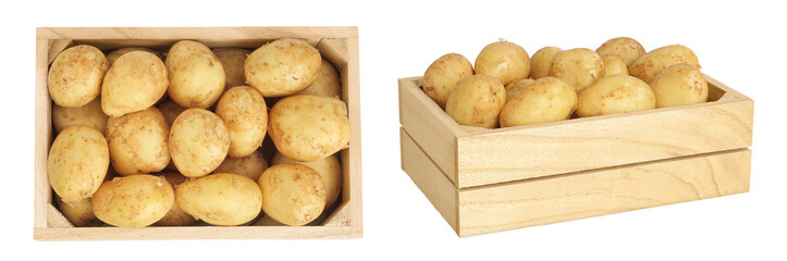 young potato slices in a wooden box isolated on white background. Harvest new. Top view. Flat lay.