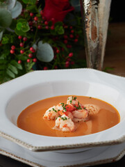 Shrimp bisque with prawns and chives for fine dining