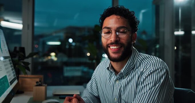 Computer screen, data and face of business man in office at night for trading. Finance, completed deadline and smile with happy employee in workplace for international stock market investment