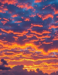 Fototapeta premium Breathtaking panoramic sunset sky, vibrant hues of orange, pink, and purple paint the horizon, clouds ablaze with golden light, orange, background, colorful