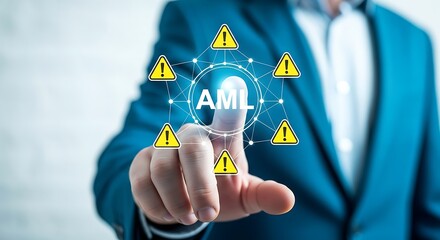 Businessman touching a digital screen displaying aml with warning signs around it, representing antimoney laundering risks
