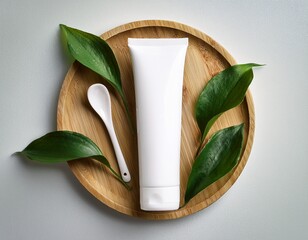 white tube mockup with green leaves and spoon