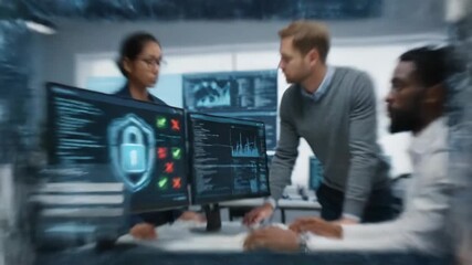 Cybersecurity Team Analyzing Data - A diverse team of cybersecurity professionals collaborates around computer monitors displaying encrypted data and security protocols, working together to identify - Powered by Adobe