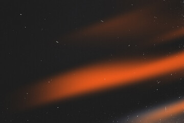 Light overlay, orange warm color. Blurry spots. Old film light leak texture with scratches, grain, noise and dust. Perfect as background or overlay for photo editing, video design, and digital art.