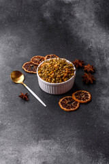 Dried chamomile flowers, herbal tea in a bowl for a hot morning drink. Dried chamomile