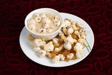 Makhana Kheer is a traditional Indian dessert made with fox nuts, milk, sugar, and dry fruits. Popular in Bihar, it’s a nutritious, creamy dish often prepared during festivals and fasting rituals.