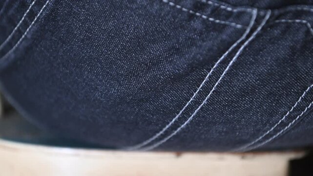 Crushing a walnut under the thigh