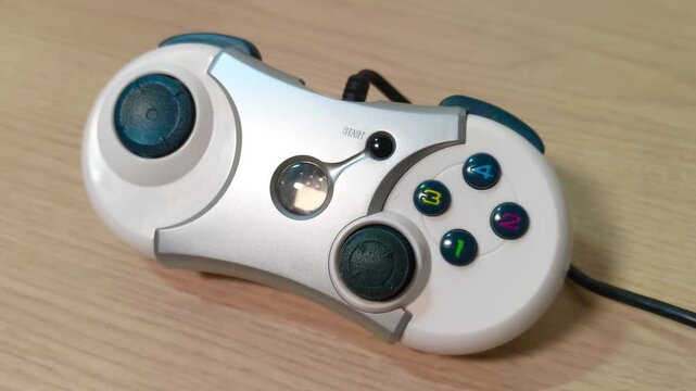 Experience retro gaming action with a classic controller, perfect for showcasing gameplay and nostalgia, ideal for vintage tech enthusiasts and highlighting video game history