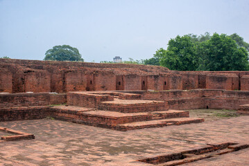 Fototapeta premium The ruins of Nalanda University in Bihar are a UNESCO World Heritage Site, once a great center of learning (5th–12th century). Its red-brick monasteries, temples, and libraries reflect India’s ancient