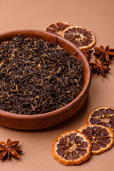 Golden black tea, dried leaves of a Chinese or Indian breakfast drink. Black tea dried leaves