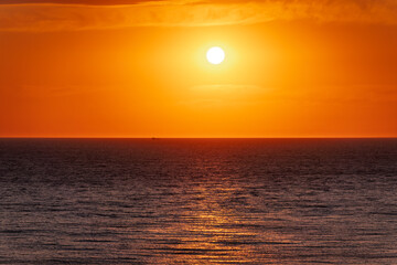 Beautiful red and orange sunrise over the sea.