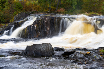 A beautiful Quebec waterfall in the fall colors