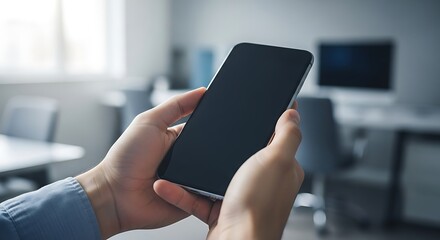 Hands Holding a Smartphone with Blank Screen mobile