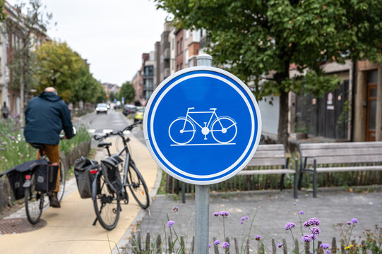 Cycling path through small park in Jette, Brussels Capital Region, Belgium