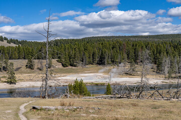 The Yellowstone River. Mud Volcano area,  Yellowstone National Park, Wyoming. A mud volcano or mud...