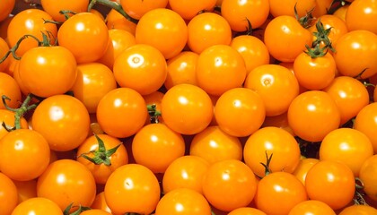 A Close-up Shot of a Pile of Bright Yellow Cherry Tomatoes