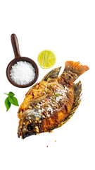 Crispy fried fish, garnished with lime, salt, and herbs