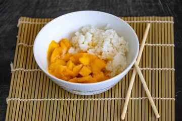 Mango sticky rice This Thai dessert of glutinous sticky rice, seasoned with salty-sweet coconut milk and served with tender, fragrant slices of mango, will be irresistible.