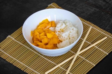Mango sticky rice This Thai dessert of glutinous sticky rice, seasoned with salty-sweet coconut milk and served with tender, fragrant slices of mango, will be irresistible.